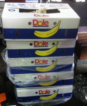 Food, banana, stack of packing boxes QVM