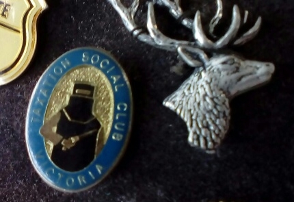 Taxation Social Club badge, photograph 2016.